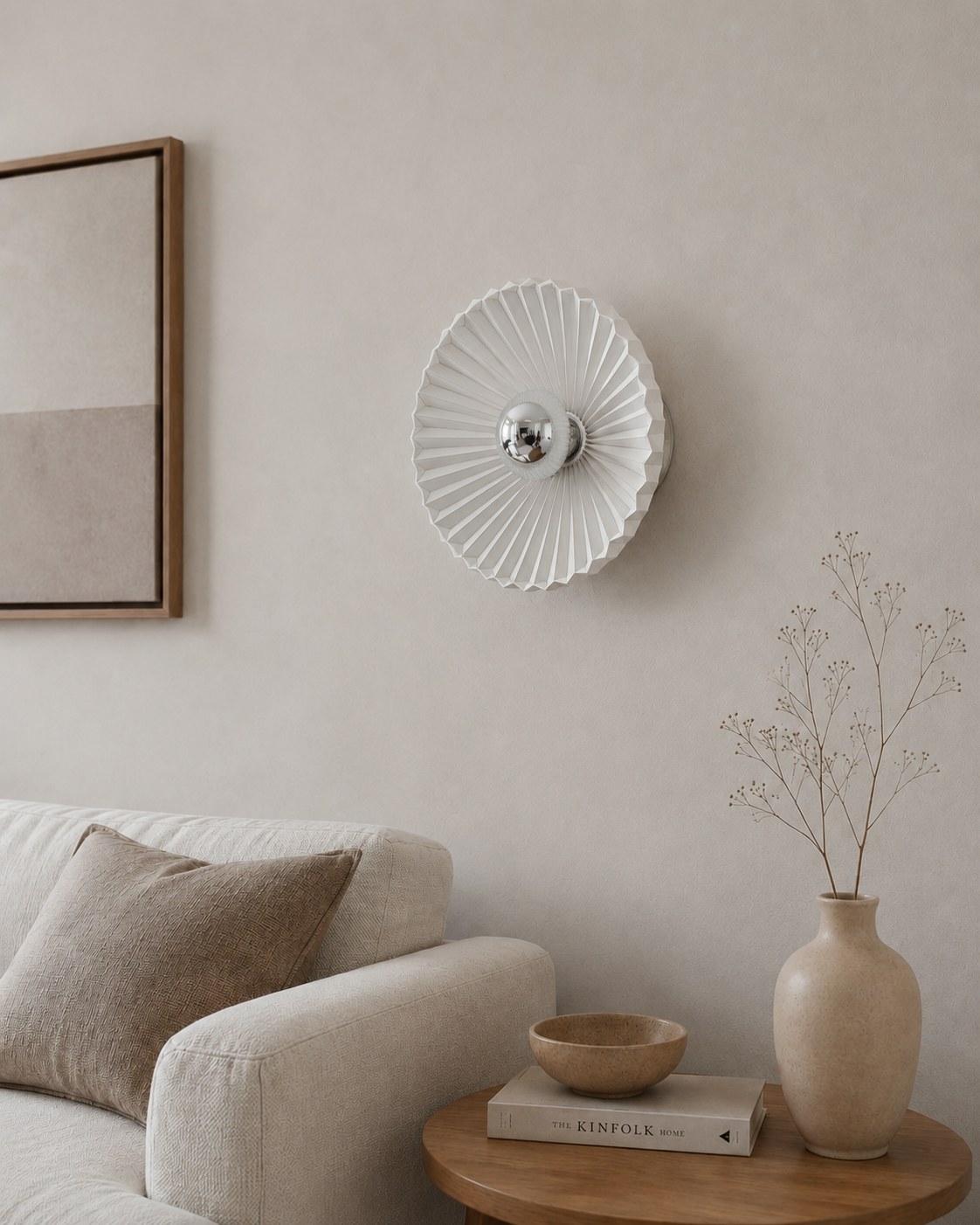 Pleated sunburst wall sconce with a chrome centre sphere, living room, unlit